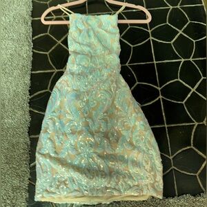 Champagne sequenced dress. fits above knee. lace up back. Windsor dress
